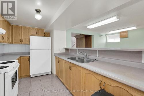 100 North Carson Street, Toronto (Alderwood), ON - Indoor Photo Showing Kitchen With Double Sink