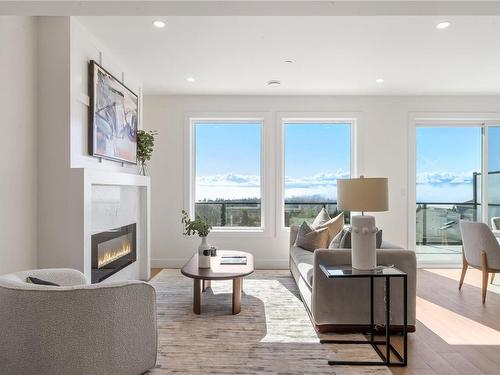 2299 Hudson Terr, Sooke, BC - Indoor Photo Showing Living Room With Fireplace