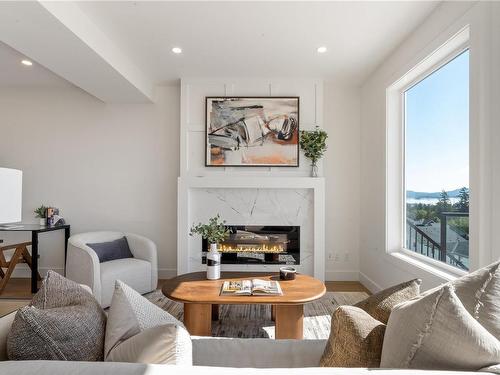 2299 Hudson Terr, Sooke, BC - Indoor Photo Showing Living Room With Fireplace