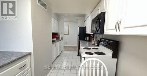 402 - 3233 Eglinton Avenue E, Toronto (Scarborough Village), ON - Indoor Photo Showing Kitchen