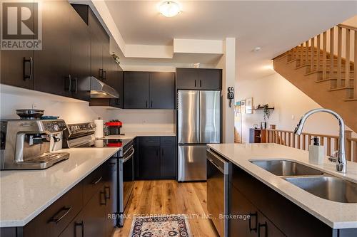 16 Raspberry Lane, Hamilton (Mount Hope), ON - Indoor Photo Showing Kitchen With Double Sink