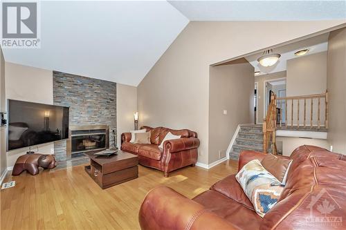 12 Silver Horse Crescent, Ottawa, ON - Indoor Photo Showing Living Room With Fireplace