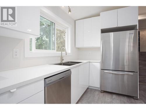 254 Terrace Drive, Kelowna, BC - Indoor Photo Showing Kitchen With Double Sink