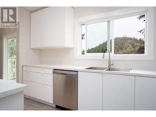 254 Terrace Drive, Kelowna, BC - Indoor Photo Showing Kitchen With Double Sink