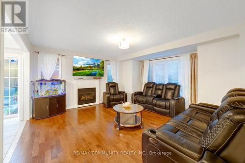 10 Shuttleworth Drive, Clarington (Courtice), ON - Indoor Photo Showing Living Room With Fireplace