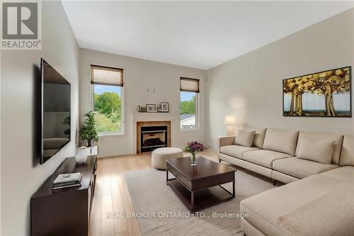 31 Hoodless Court, Brantford, ON - Indoor Photo Showing Living Room With Fireplace