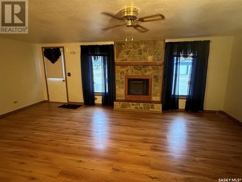 138 17Th Street, Weyburn, SK - Indoor With Fireplace