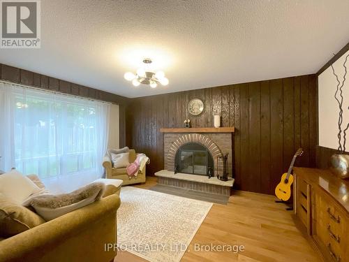 73 Wright Crescent, Caledon, ON - Indoor Photo Showing Living Room With Fireplace