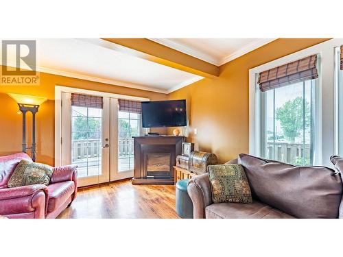 2816 3 Highway, Erickson, BC - Indoor Photo Showing Living Room With Fireplace