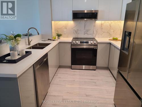 510 - 48 Suncrest Boulevard, Markham (Commerce Valley), ON - Indoor Photo Showing Kitchen With Stainless Steel Kitchen With Double Sink With Upgraded Kitchen