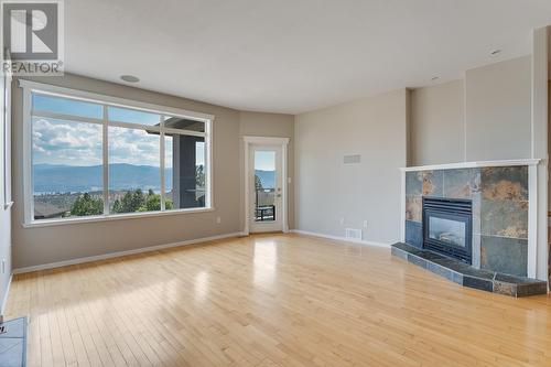 3362 Sundance Drive, West Kelowna, BC - Indoor Photo Showing Living Room With Fireplace