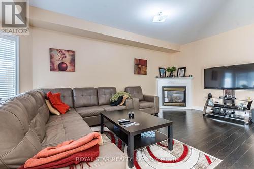 12 Pappain Crescent S, Brampton (Snelgrove), ON - Indoor Photo Showing Living Room With Fireplace