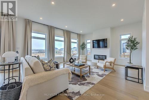 4055 Winterberry Drive, London, ON - Indoor Photo Showing Living Room With Fireplace