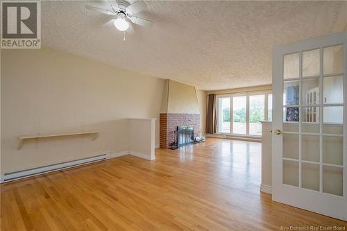 21 Richard Avenue, Bouctouche, NB - Indoor With Fireplace