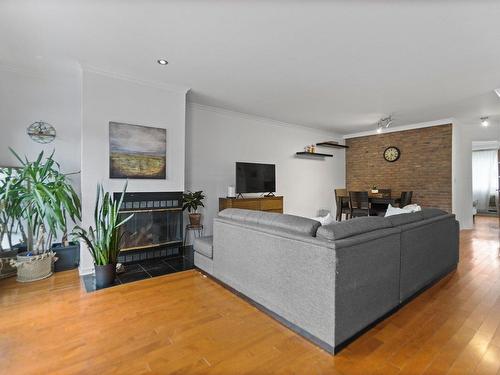 Salon - 3370 Rue Dalbé-Viau, Montréal (Lachine), QC - Indoor Photo Showing Living Room With Fireplace