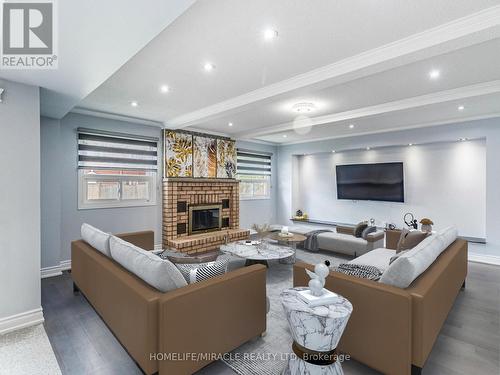 3821 Trelawny Circle, Mississauga, ON - Indoor Photo Showing Living Room With Fireplace