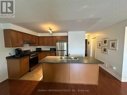 1 - 2709 Bur Oak Avenue, Markham (Cornell), ON - Indoor Photo Showing Kitchen With Stainless Steel Kitchen With Double Sink