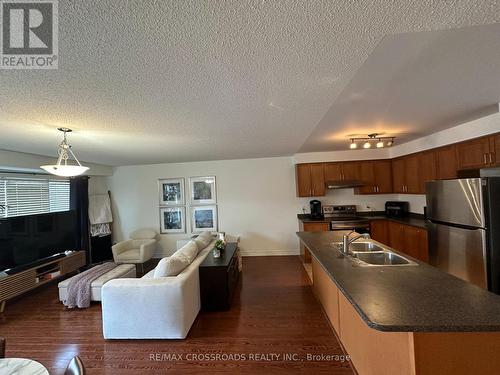 1 - 2709 Bur Oak Avenue, Markham (Cornell), ON - Indoor Photo Showing Kitchen With Double Sink