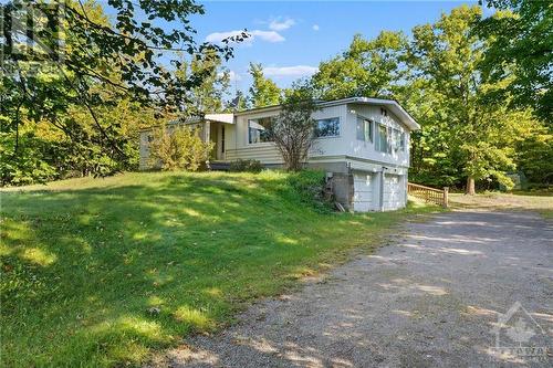 Front view showing garage under. - 1338 Usborne Street, Braeside, ON - Outdoor