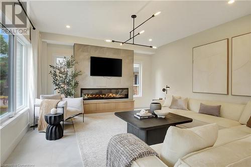 87 Dunnigan Drive, Kitchener, ON - Indoor Photo Showing Living Room With Fireplace