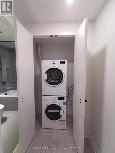 4212 - 55 Charles Street E, Toronto, ON - Indoor Photo Showing Laundry Room