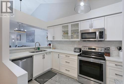 219 - 65 Bristol Road E, Mississauga (Hurontario), ON - Indoor Photo Showing Kitchen With Stainless Steel Kitchen With Double Sink