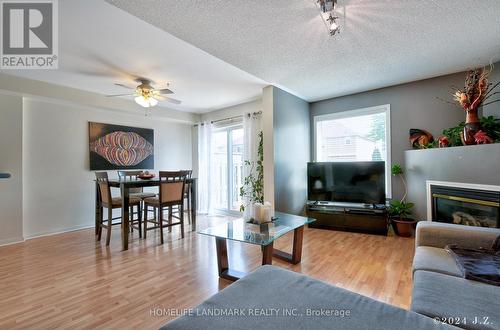 3943 Coachman Circle, Mississauga, ON - Indoor Photo Showing Living Room With Fireplace