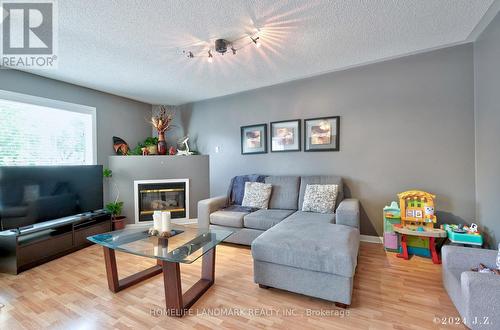 3943 Coachman Circle, Mississauga, ON - Indoor Photo Showing Living Room With Fireplace