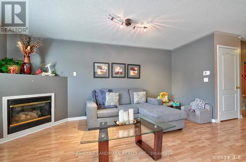 3943 Coachman Circle, Mississauga, ON - Indoor Photo Showing Living Room With Fireplace