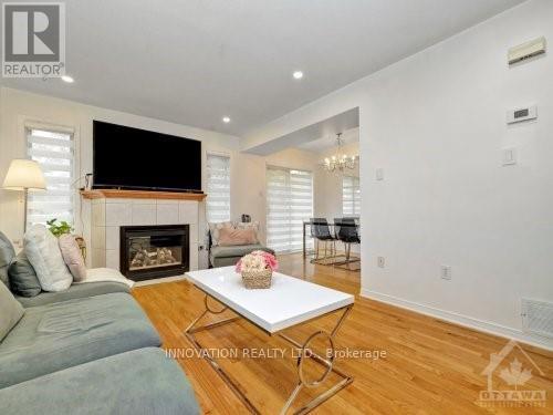 2877 Millstream Way, Ottawa, ON - Indoor Photo Showing Living Room With Fireplace