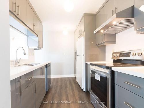 804-4205 Shipp Dr, Mississauga, ON - Indoor Photo Showing Kitchen With Double Sink