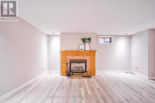 1321 Monks Passage, Oakville (Glen Abbey), ON - Indoor Photo Showing Living Room With Fireplace