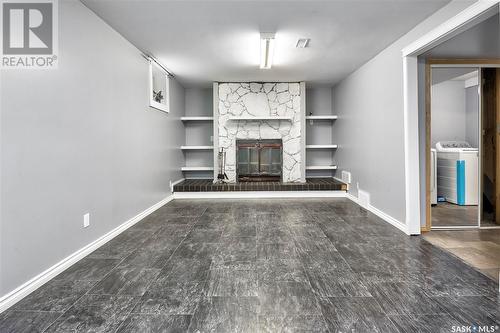 34 26Th Street E, Prince Albert, SK - Indoor With Fireplace