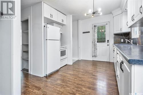 34 26Th Street E, Prince Albert, SK - Indoor Photo Showing Kitchen With Double Sink