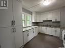 125 L Avenue S, Saskatoon, SK  - Indoor Photo Showing Kitchen With Double Sink 