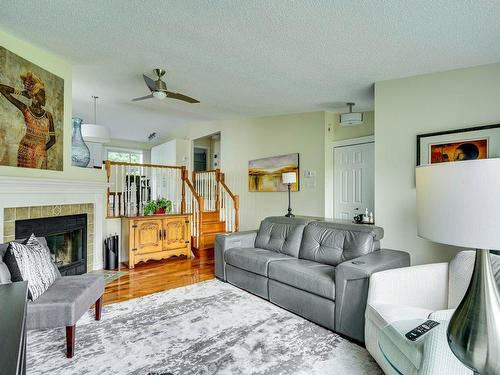 Living room - 42 Av. Vital, Saint-Sauveur, QC - Indoor Photo Showing Living Room With Fireplace