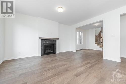 138 Lumen Place, Ottawa, ON - Indoor Photo Showing Living Room With Fireplace