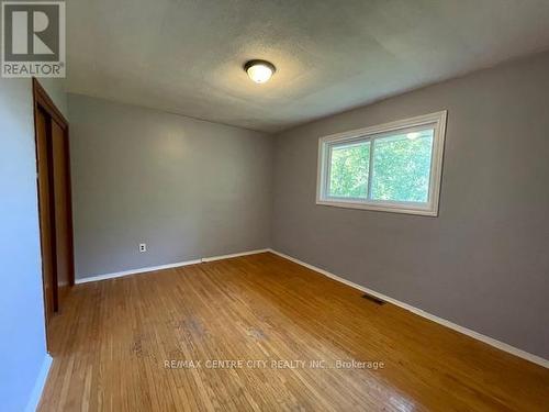 187 Bedroom facing mature fenced backyard. - 187-189 Taylor Street, London, ON - Indoor Photo Showing Other Room