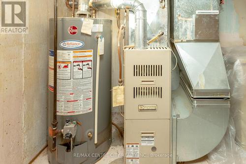 187 Gas Furnace and Hot Water Tank. - 187-189 Taylor Street, London, ON - Indoor Photo Showing Basement