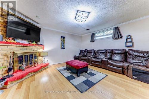 20 Histon Crescent, Brampton, ON - Indoor Photo Showing Living Room With Fireplace