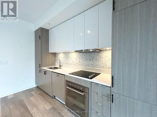 A201 - 5230 Dundas Street, Burlington (Orchard), ON - Indoor Photo Showing Kitchen With Double Sink