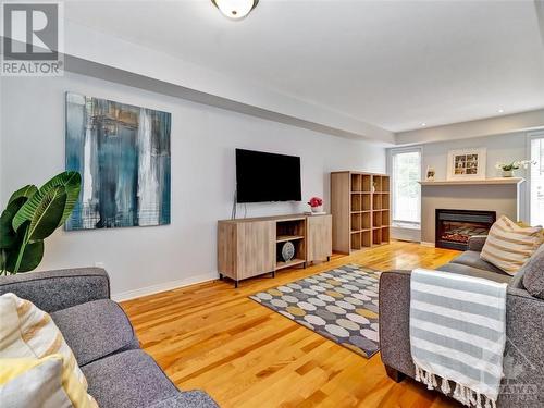 424 Ashbourne Crescent, Ottawa, ON - Indoor Photo Showing Living Room With Fireplace