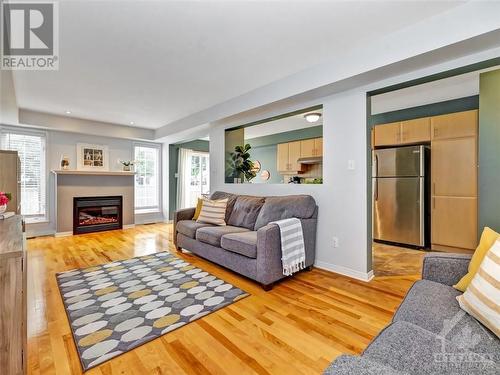 424 Ashbourne Crescent, Ottawa, ON - Indoor Photo Showing Living Room With Fireplace