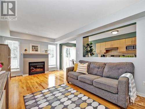 424 Ashbourne Crescent, Ottawa, ON - Indoor Photo Showing Living Room With Fireplace