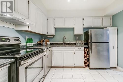 157 - 1951 Rathburn Road E, Mississauga, ON - Indoor Photo Showing Kitchen With Double Sink