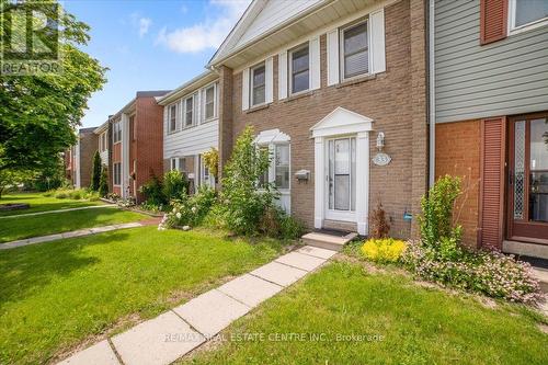 33 - 1020 Central Park Drive, Brampton, ON - Outdoor With Facade