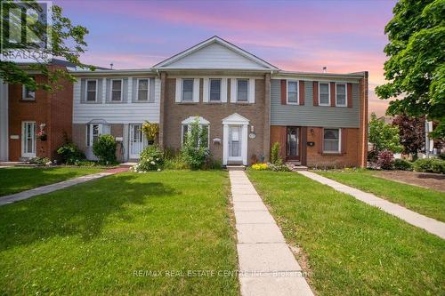 33 - 1020 Central Park Drive, Brampton, ON - Outdoor With Facade