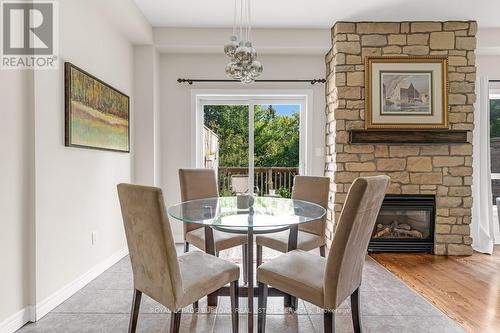 4131 Medland Drive, Burlington (Headon), ON - Indoor Photo Showing Dining Room With Fireplace