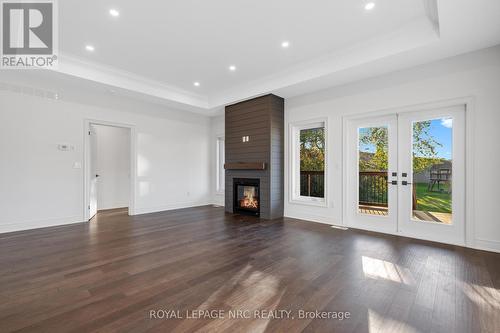 203 Elmwood Avenue, Fort Erie (Crystal Beach), ON - Indoor Photo Showing Living Room With Fireplace