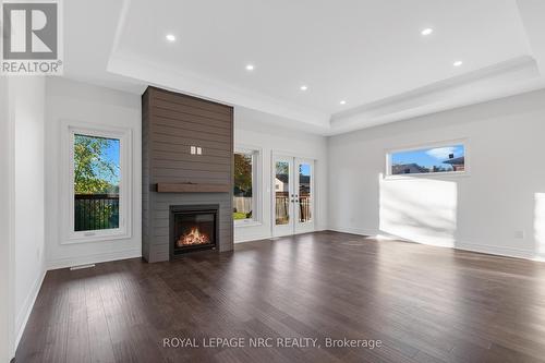 203 Elmwood Avenue, Fort Erie, ON - Indoor Photo Showing Living Room With Fireplace